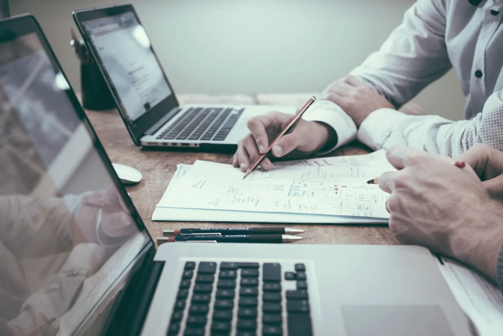 Executive reviewing strategy documents and planning timeline